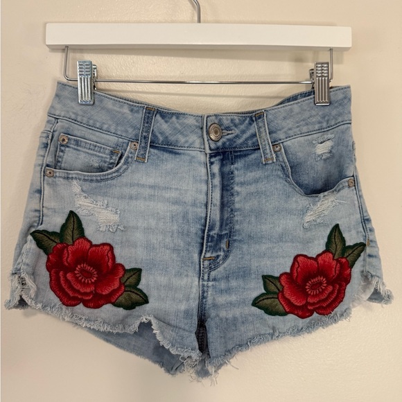 American Eagle Outfitters Pants - American Eagle Embroidered denim hi-rise short with red rose accent in size 8